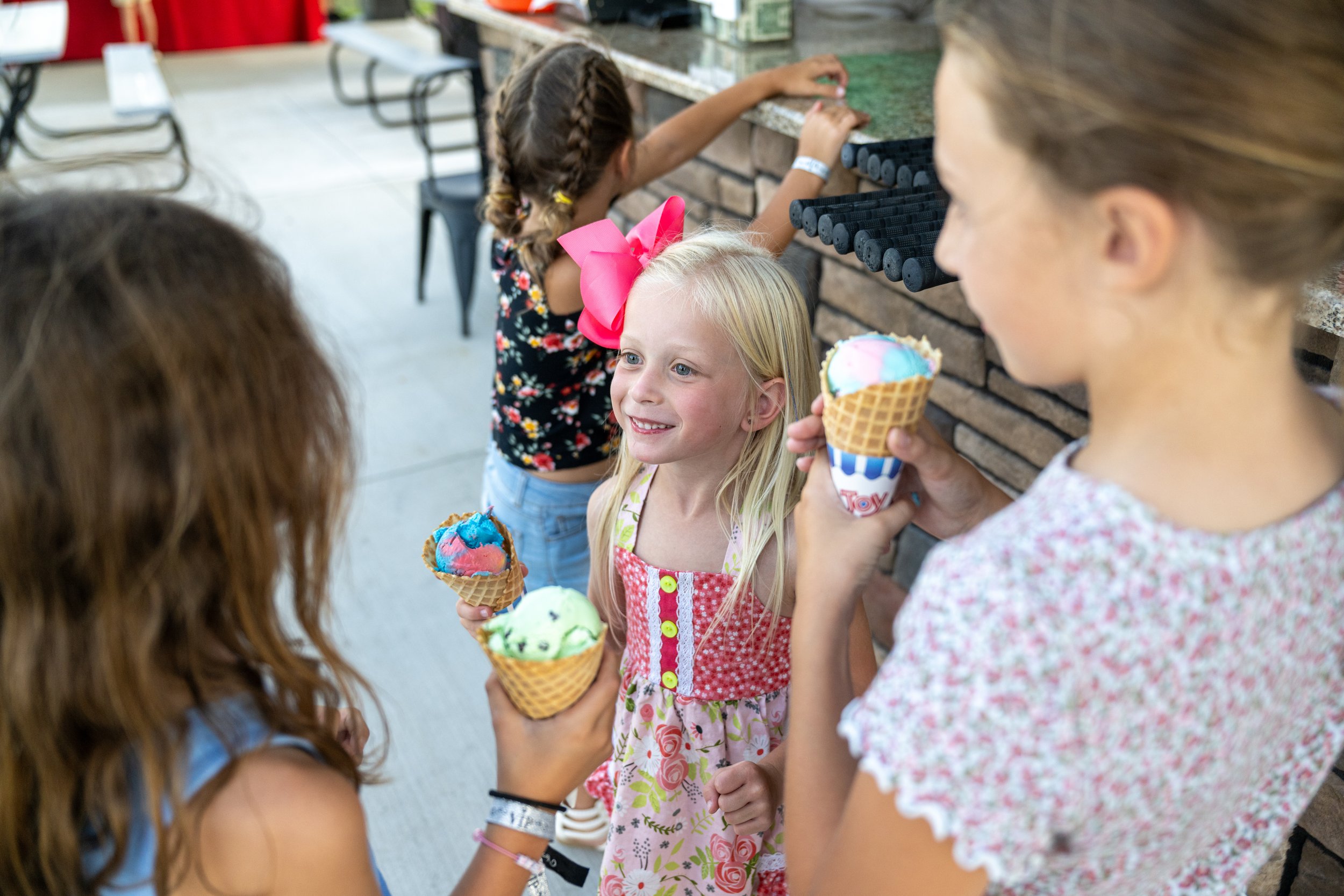 Children enjoying treats at the event