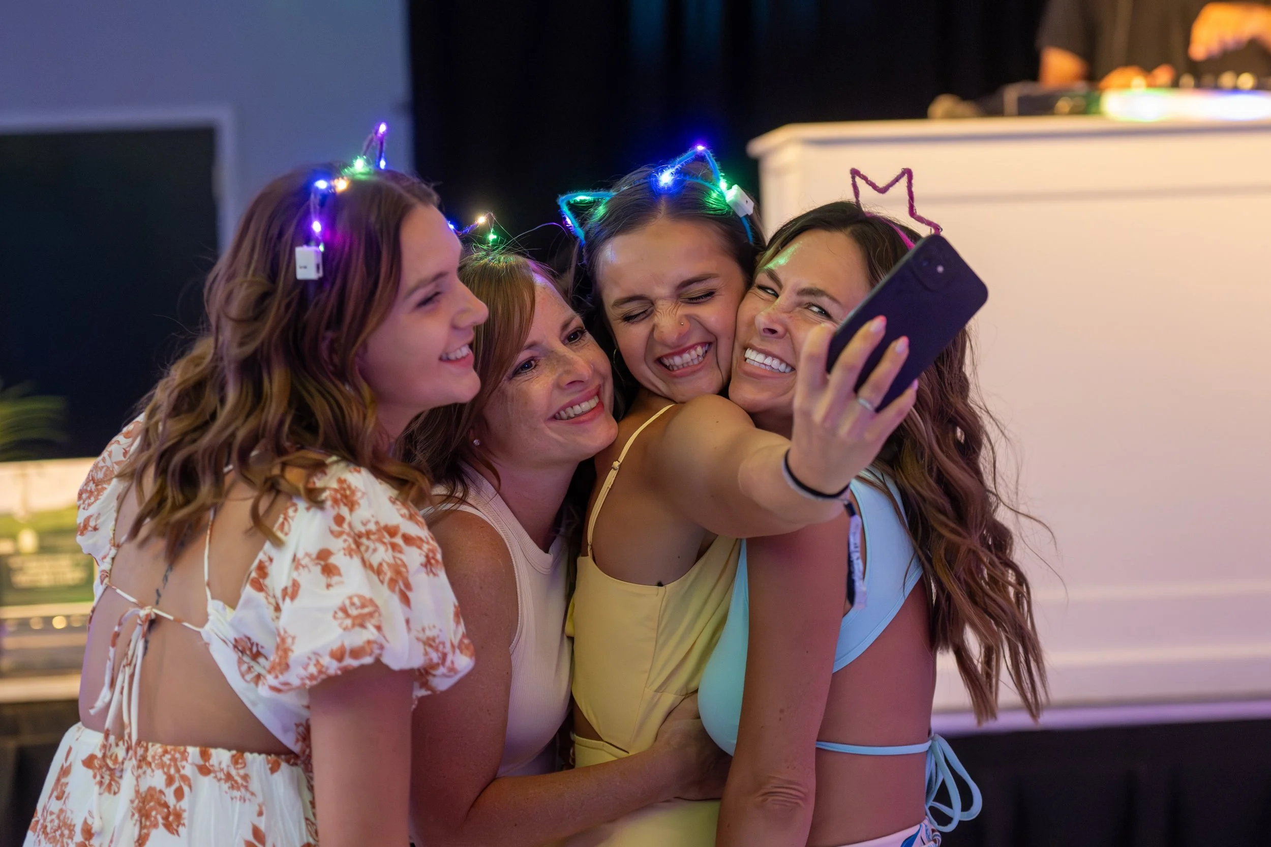 Friends celebrating at Sparks of Giving
